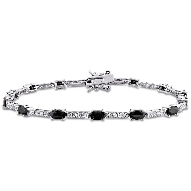 Personalized silver bracelets for couples-Miadora 8ct TGW Black and White Cubic Zirconia Station Bracelet in Sterling Silver - 7 in