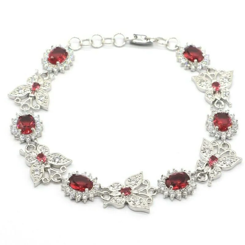 Custom silver bracelets for women-Sterling Silver Garnet Butterfly Shape Tennis Bracelet