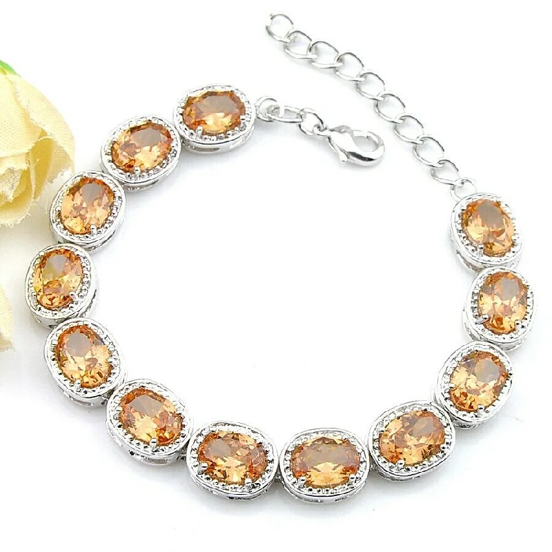 Elegant pearl bracelets for weddings-Sterling Silver Oval Cut Champagne Morganite Tennis Bracelet