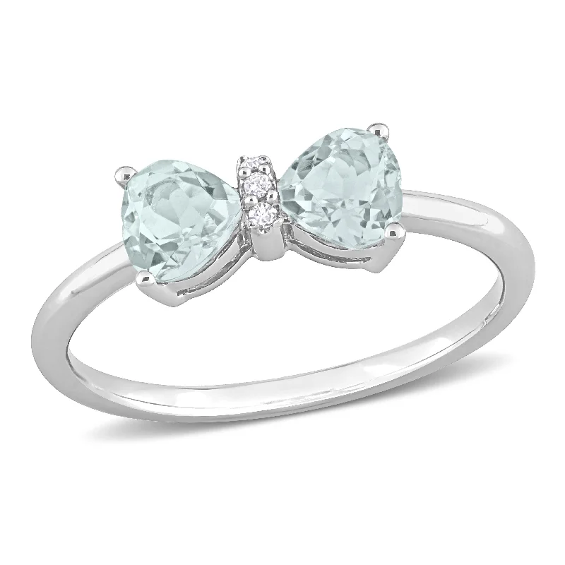 Fashionable stacking rings for women-Miadora 3/4ct TGW Aquamarine and Diamond Accent Bow Ring in 10k White Gold